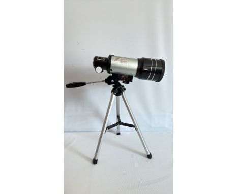 Refractor telescope with tripod.