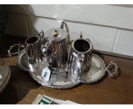 A Three Piece Plated Tea Service, Together With A Two Handled Plated Serving Tray