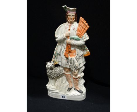     A Staffordshire Pottery Portrait Figure Of A Scottish Musician                  