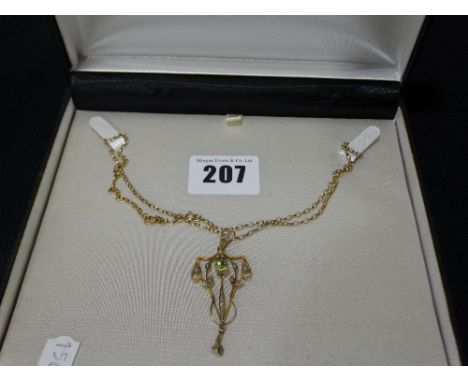     A Gold Art Nouveau Pearl &amp; Peridot Set Pendant On A Fine Link Gold Chain        