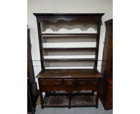 An Antique Oak Dresser, The Base Having Three Drawers With Open Pot Board Shelf, The Associated Top Having Three Shelves, 54"