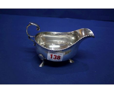 A silver sauce boat, by Harrison Brothers & Howson, Sheffield 1944, 144g.