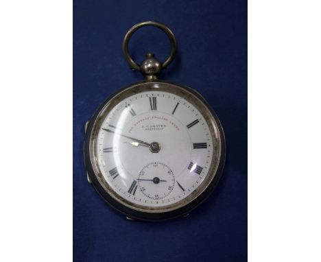 A silver pocket watch, the 4.3cm white enamel dial signed J G Graves, Sheffield and 'The Express English Lever', with subsidi