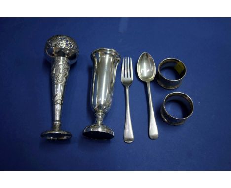 A silver stem vase, by Adie Brothers Ltd, 14cm; together with a Colonial metal stem vase; a pair of silver napkin rings and a