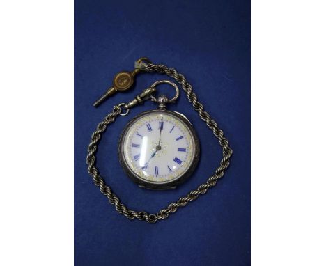 A .935 silver fob watch, having white enamel dial decorated Roman numerals, key wind.