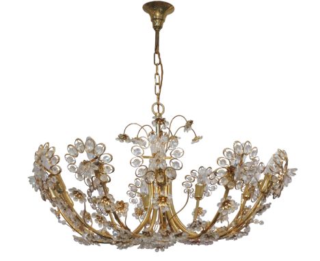 Palwa, a twelve light chandelier, circa 1970, gilt brass, faceted glass, electrical fittings, 77cm highIt is the buyer's resp