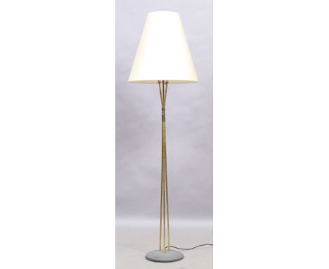 A French standard lamp, c.1950/60s, with tapered shade on tripod brass stand and circular base, 162cm highIt is the buyer’s r