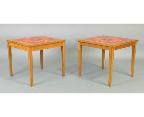 Near pair of oak and tile top side tables, circa 1960/70, the square tops inset with floral pattern red and orange glazed til