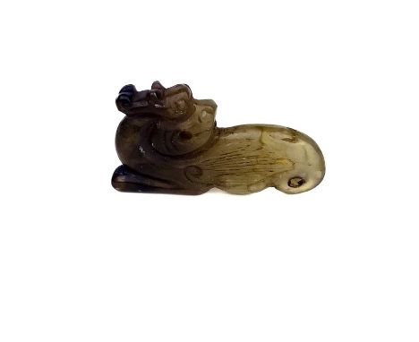 A Chinese carved jade kylin, Qing Dynasty. 2.5 x 4.8cm.
