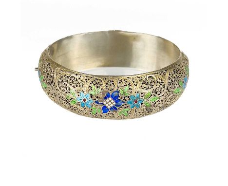 A Chinese silver filigree hinged bangle, early 20th century. With enamel foliate decoration, inner diameter 6cm, outer diamet