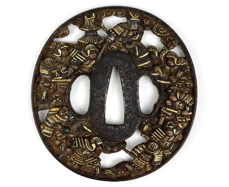 A Japanese iron and gold decorated tsuba, Edo Period. Signed, finely detailed with battle scenes, 7.5 x 7cmFrom the estate of