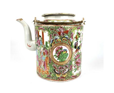 A Chinese Canton porcelain teapot, 19th century. Height 17cm, width 19cm, diameter of body 13cm.