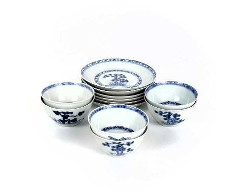 Six Chinese blue and white porcelain Nanking Cargo tea bowls and saucers, 18th century.  Ex Christies lot stickers attached. 