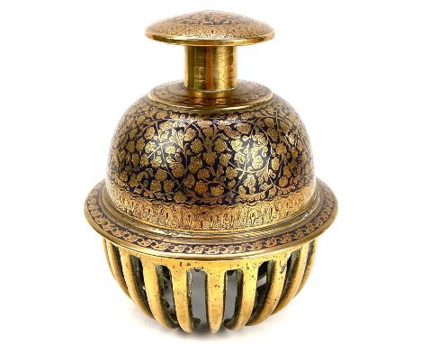 A large Indian brass and enamel elephant claw bell. Height 17cm.