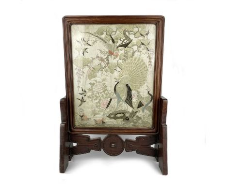 A Chinese hardwood framed silk embroidered table screen, 19th century. Decorated with birds, height 66cm, width 46cm, size of