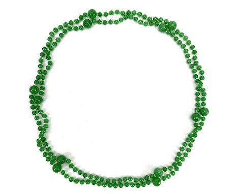 A string of graduating apple jade beads. Largest bead daimeter 1cm.