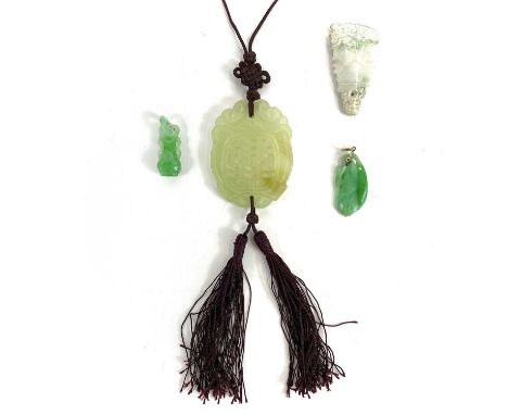A Chinese jade pendant. Length 6cm, together with three other Chinese jade pendants. (4)