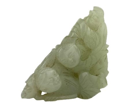A Chinese pale jade carving of two boys, Qing Dynasty. Height 5cm, width 4.5cm, depth 1.5cm.From the estate of Frederic Lipsc