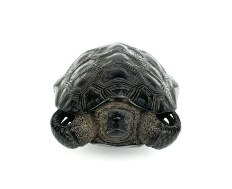 A Japanese carved wood netsuke in the form of a turtle, 19th century. Signed, height 2cm, length 4.5cm, width 3.5cm.From the 
