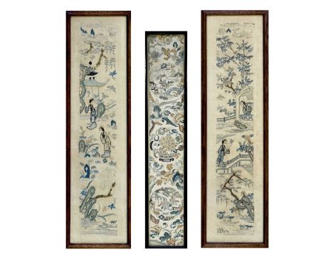 A Chinese textile panel decorated with landscapes in roundels and flowers. Together with a pair of Chinese textile panels dec