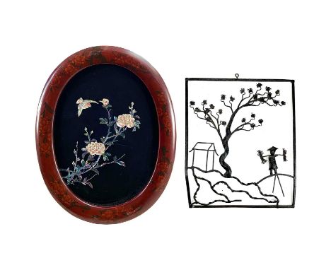 A Japanese lacquer oval panel inlaid with mother of pearl. Decorated with a bird amongst flowers 42.5cm x 54cm together with 