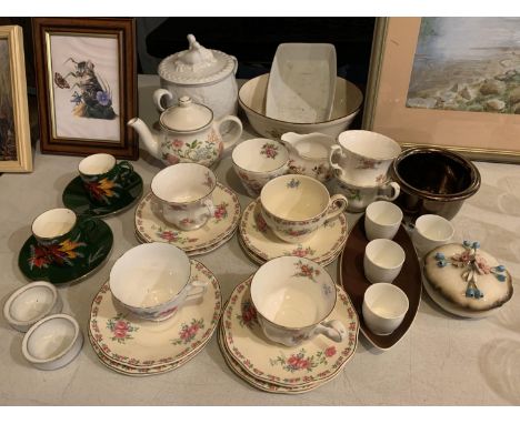 A NUMBER OF CERAMIC ITEMS TO INCLUDE TEACUPS AND SAUCERS, TEAPOTS AND EGG CUPS 