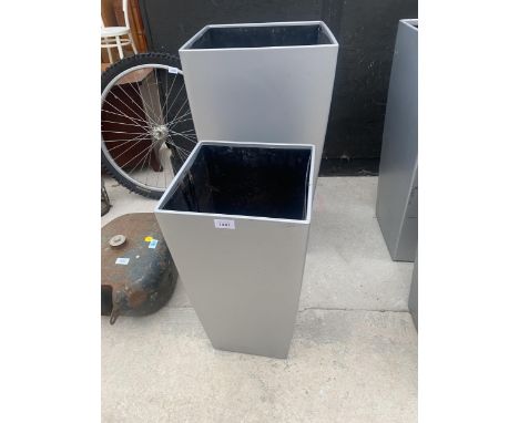 A GREY FIBRE GLASS PLANTER (H;75CM) AND A FURTHER SMALL GREY FIBRE GLASS PLANTER (H:56CM) 