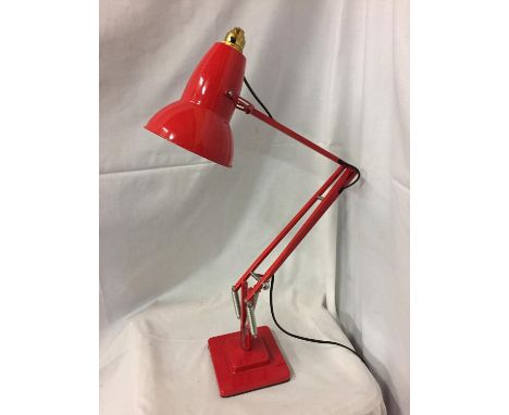 A RED ANGLE POISE LAMP 