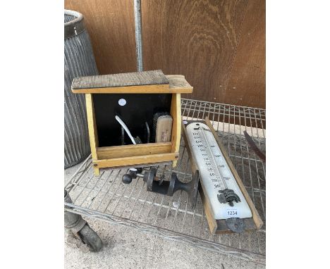 AN ASSORTMENT OF ITEMS TO INCLUDE A VINTAGE PRESS, A VINTAGE THERMOMETER AND A SHOE SHINE BOX 