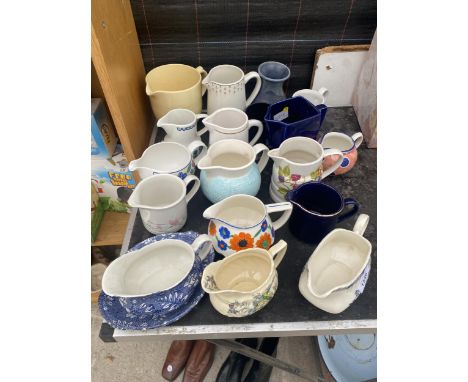 A LARGE ASSORTMENT OF CERAMIC JUGS TO INCLUDE ROYAL DOULTON 'THE KIRKWOOD', A ROYAL TUDOR VELVET GRAVY BOAT WITH PLATE BY GRI