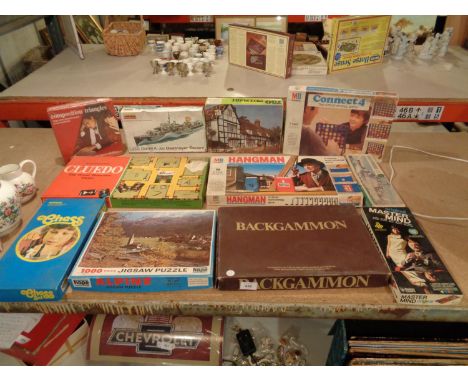 A LARGE SELECTION OF GAMES TO INCLUDE JIGSAW PUZZLES, CHESS SETS, CONNECT 4, BACKGAMMON ETC 