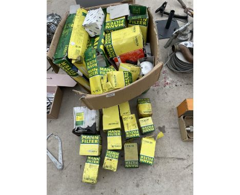 A LARGE ASSORTMENT OF VARIOUS AUTOMOBILE FILTERS 