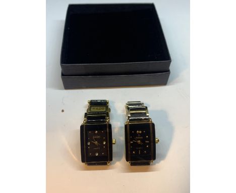 TWO BLACK AND YELLOW METAL RADO WRIST WATCHES SEEN WORKING BUT NO WARRANTY WITH A PRESENTATION BOX 