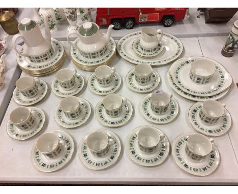 A LARGE QUANTITY OF ROYAL DOULTON TAPESTRY DINNERWARE TO INCLUDE, CUPS AND SAUCERS, PLATES, COFFEE AND TEA POTS, MILK JUG AND