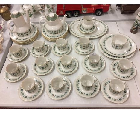 A LARGE QUANTITY OF ROYAL DOULTON TAPESTRY DINNERWARE TO INCLUDE, CUPS AND SAUCERS, PLATES, COFFEE AND TEA POTS, MILK JUG AND