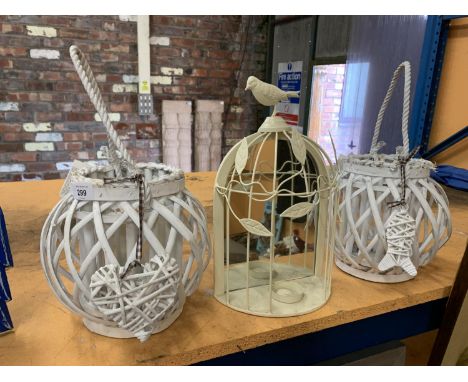 AS NEW TWO HANGING LANTERN STYLE CANDLE HOLDERS ON A ROPE HANDLE WITH A METAL BIRD CAGE STYLE MIRRORED TEA LIGHT HOLDER 