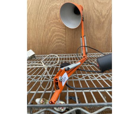 A VINTAGE AND RETRO ORANGE ANGLE POISE LAMP 