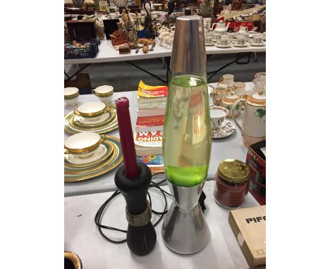 A DARTINGTON STUDIO CANDLE STICK AND A LAVA LAMP 