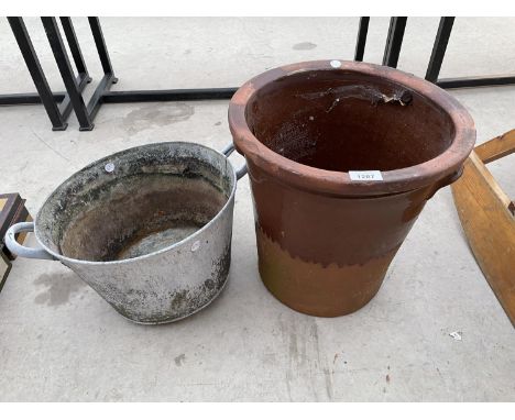 A LARGE CERAMIC PLANTER AND A FURTHER GALVANISED TWIN HANDLED PAN 