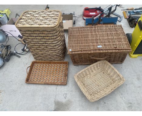 AN ASSORTMENT OF WICKER BASKETS TO INCLUDE A PICNIC HAMPER AND A LAUNDRY BASKET ETC 