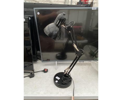 AN ANGLE POISE DESK LAMP 