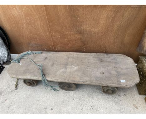 A VINTAGE SIX WHEELED TROLLEY POSSIBLY FROM A RAILWAY 