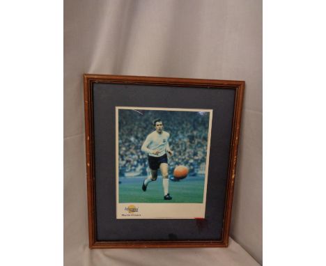 A FRAMED SIGNED PICTURE OF MARTIN CHIVERS PLAYING FOR ENGLAND WITH CERTIFICATE OF AUTHENTICITY 