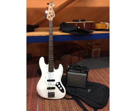 A FENDER BASS GUITAR WITH AN AMPLIFIER, SB15 AND CASE 