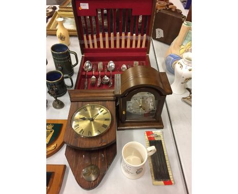 A WOOD CASED MANTLE CLOCK, WOOD CASED WALL CLOCK AND A BOXED CANTEEN OF CUTLERY 