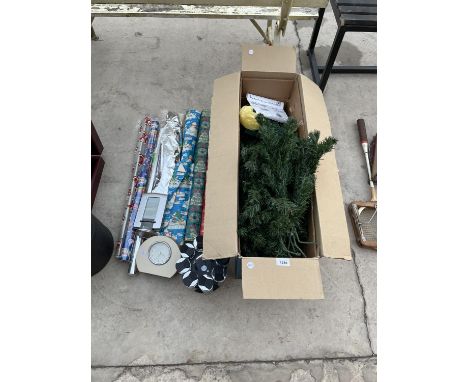 AN ASSORTMENT OF ITEMS TO INCLUDE WRAPPING PAPER, AN ARTIFICIAL CHRISTMAS TREE AND SPICE RACK ETC 