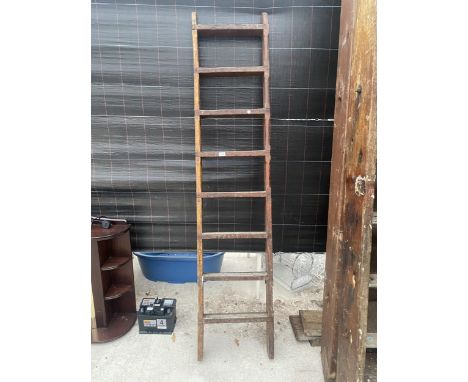 A VINTAGE EIGHT RUNG CLIMBING FRAME LADDER 