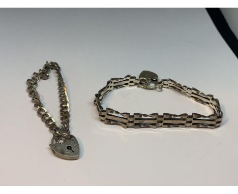 TWO SILVER BRACELETS TO INCLUDE A GATE DESIGN 
