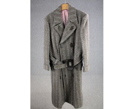 A vintage bespoke made silk lined herringbone tweed long overcoat with statement buckle,&nbsp;(medium/large).