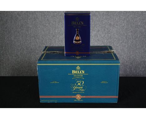 Bell's Whisky. An unopened case of six presentation decanter bottles. Special edition, issued 2002 to commemorate  Queens Eli